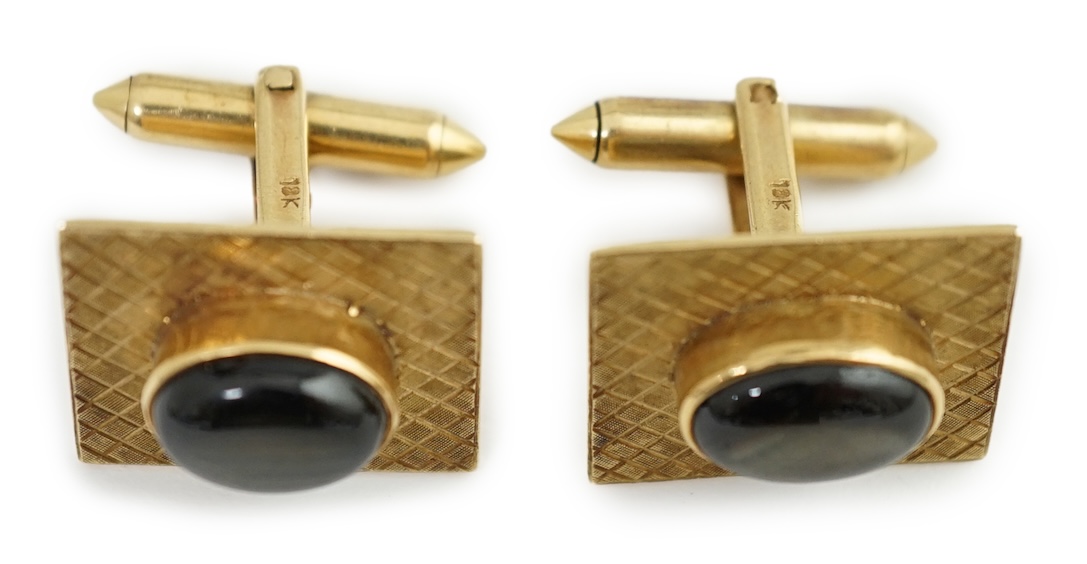 A pair of 18K gold tablet cufflinks, mounted with grey quartz cabochons, in a rubover setting